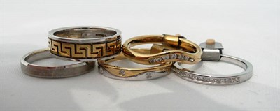 Lot 89 - Four 9ct gold rings (two diamond set) and an 18ct gold half eternity ring