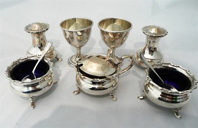 Lot 92 - A five piece condiment set and two egg cups