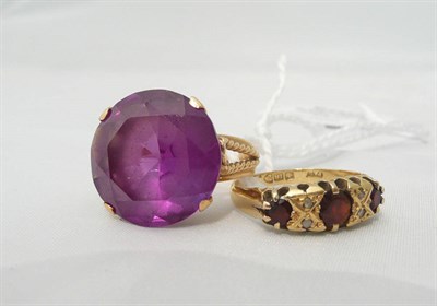 Lot 97 - An 18ct gold garnet and diamond ring and an alexandrite simulant ring