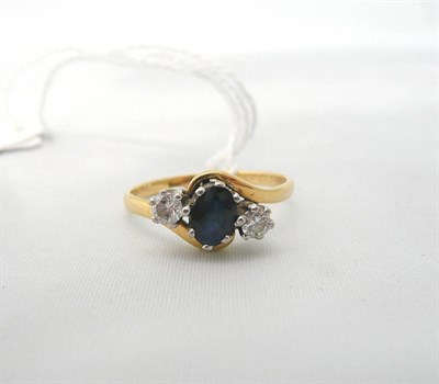 Lot 104 - Sapphire and diamond ring