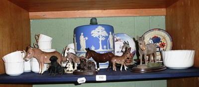 Lot 110 - A collection of donkeys including Beswick, Border Fine Arts etc, a blue and white stilton cover and