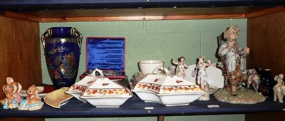 Lot 116 - A shelf of decorative ceramics including Poole, Crown Devon, etc also a carved ivory figure, silver