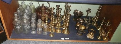Lot 119 - Quantity of brass candlesticks, chestnut bottles etc