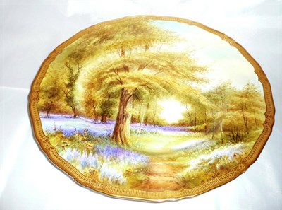 Lot 123 - A Royal Worcester plate painted with a landscape 'Bluebells, Kew Gardens'