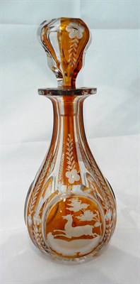 Lot 127 - An amber flash scent bottle and stopper
