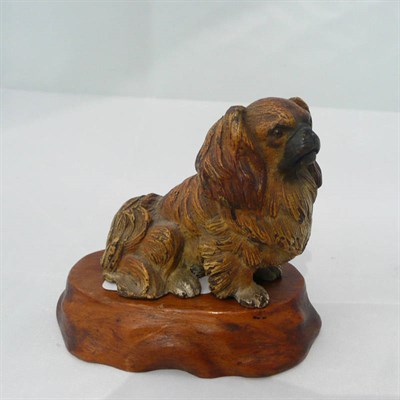 Lot 128 - An Austrian cold painted bronze model of a dog, stamped Austria