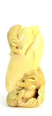 Lot 135 - A Japanese Ivory Okimono, late 19th century, as three rats devouring a fruit, naturalistically...