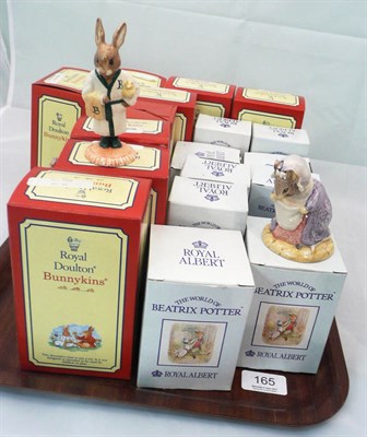 Lot 165 - Ten Royal Doulton Bunnykins figures in red and yellow boxes and nine Royal Albert Beatrix...