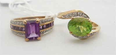 Lot 215 - An amethyst and diamond ring and a 9ct gold peridot and diamond ring