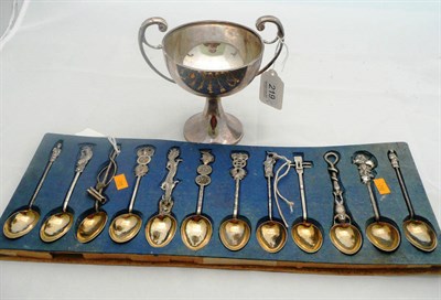 Lot 219 - A silver double handled cup 6.53oz and twelve Chinese silver teaspoons