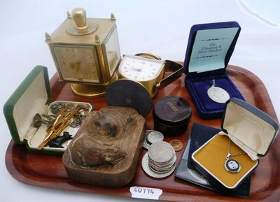 Lot 222 - A brass desk clock compendium and mouseman ashtray, quantity of stamps etc