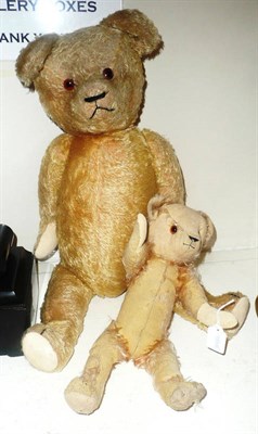 Lot 241 - An English teddy bear with articulated limbs and another