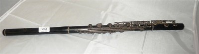 Lot 253 - An ebony and silver plate flute