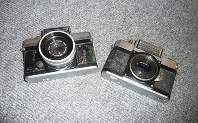 Lot 258 - Two Nikon Nikkorex 35mm SLR cameras, serial numbers 178581 & 77767, one with Nikkor-Q f2.5/50mm...