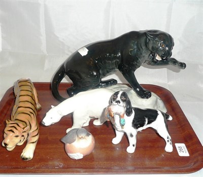 Lot 268 - A Beswick tiger, a spaniel, a panther, a polar bear and a robin