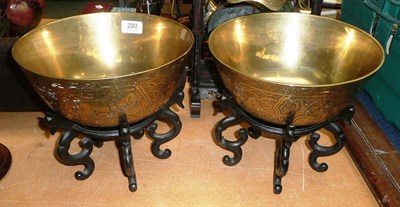 Lot 280 - Two Burmese bowls and stands, a bell on stand and four Edwardian waistcoats