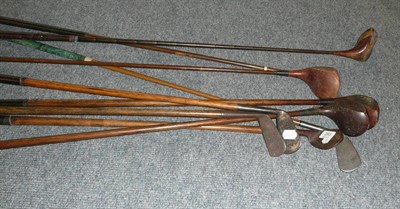 Lot 283 - Five hickory shafted golf clubs and four metal shafted clubs (9)