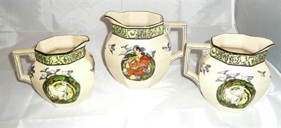 Lot 298 - Set of three graduated Royal Doulton jugs, 'Piping Down The Valleys'