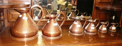 Lot 324 - Six graduated copper measures, one gallon to half gill