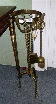 Lot 326 - Brass companion stand