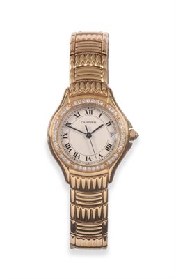 Lot 154 - A Lady's 18ct Gold Diamond Set Calendar Centre Seconds Wristwatch, signed Cartier, model:...