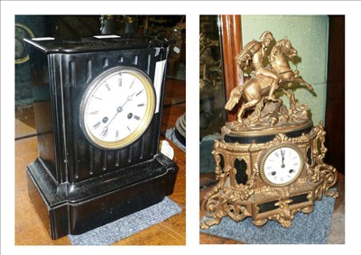 Lot 339 - A gilt metal mantel clock mounted with a horseman and a black slate mantel clock