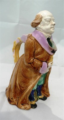 Lot 356 - A majolica character jug