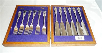 Lot 372 - A cased set of plate fish knives and forks