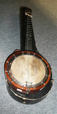 Lot 389 - A cased banjo