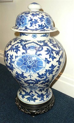 Lot 395 - Chinese blue and white vase and cover with hardwood stand