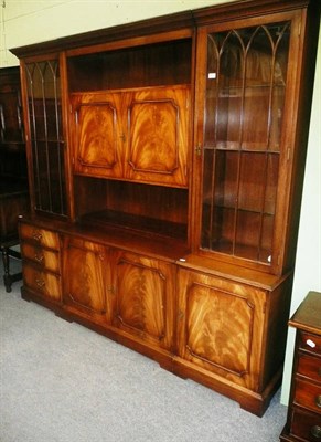 Lot 464 - A reproduction mahogany side cabinet, twin pedestal dining table and serving table