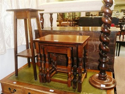 Lot 474 - Edwardian mirror and two plant stands and nest of oak tables