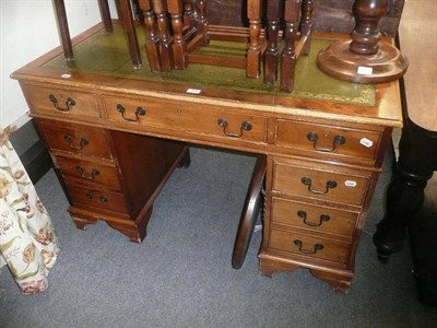 Lot 475 - A desk and a wall clock