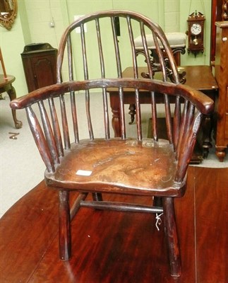 Lot 487 - A childs rustic Windsor chair