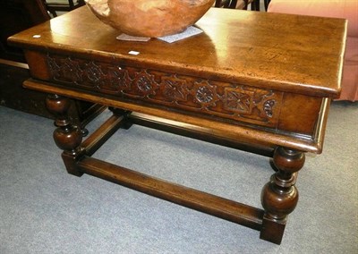 Lot 498 - A substantial oak side table circa 1920