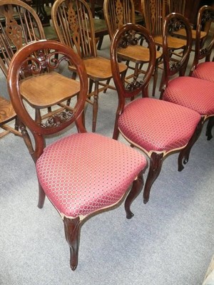 Lot 507 - A set of six Victorian mahogany balloon back chairs