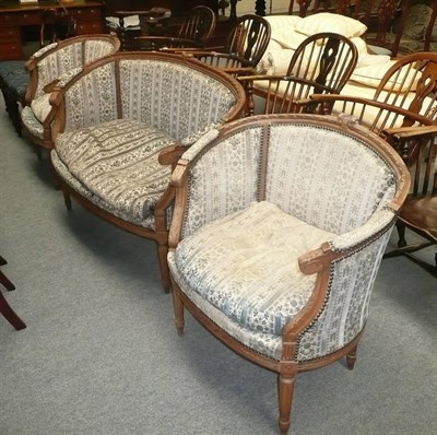 Lot 514 - A French style upholstered sofa and two chairs