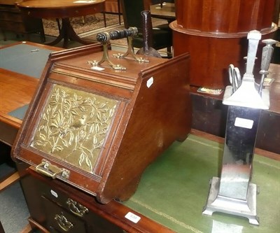 Lot 538 - A late Victorian coal perdonium with brass mounts and an art deco companion set