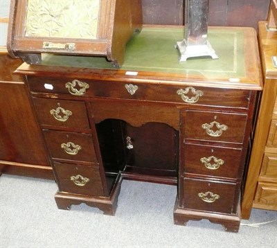 Lot 539 - Late George III mahogany knee hole desk