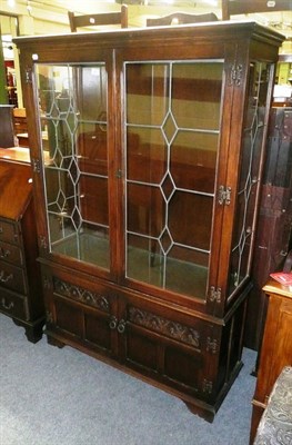 Lot 545 - Reproduction oak glazed bookcase