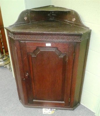 Lot 547 - 19th century oak corner cupboard