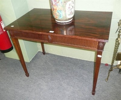 Lot 566 - A mahogany single drawer hall table