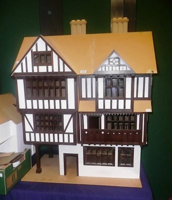 Lot 614 - Tudor style Stratford Place dolls house and a Tudor style Stratford bakery supplied by the...