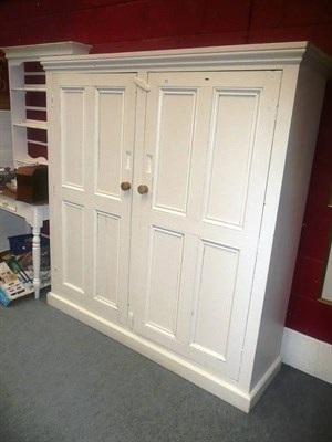 Lot 642 - White painted pine two door cupboard