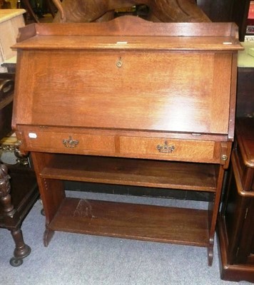 Lot 648 - A oak Arts and Crafts style bureau