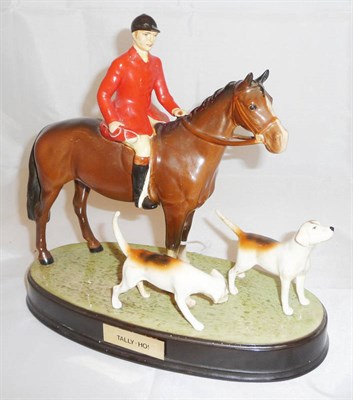 Lot 1052 - Beswick Fox Hunting Group on oval ceramic plinth comprising huntsman on standing brown horse, model