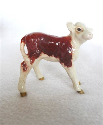 Lot 1053 - Beswick "Hereford Calf", model No. 1406B, brown and white gloss, 7.6cm high, issued 1956-1975,...