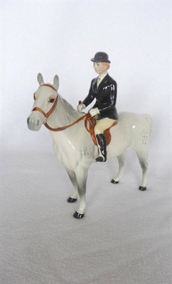 Lot 1058 - Beswick "Huntswoman" on Grey Horse, model No. 1730, gloss, 21cm high