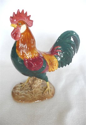 Lot 1071 - Beswick "Leghorn Cockerel", model No. 1892, teal green, red, orange and yellow, 22.9cm