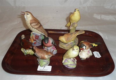 Lot 7 - Five Royal Worcester bisque figures of birds and two Beswick birds